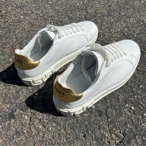 Men’s Versace white low top leather sneaker with gold logo and greca size 8-8.5